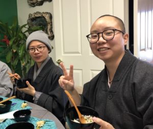 Fa-le Shi and Fa-heng Shi enjoying Oryoki meal at temple.