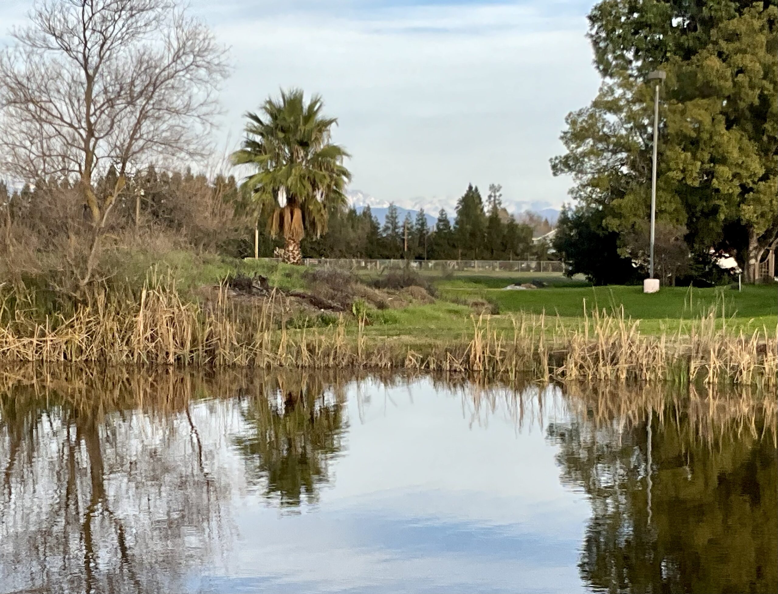 Photo of Holy Vajrasana Temple view looking East at the snow-capped Sierra Mountains.