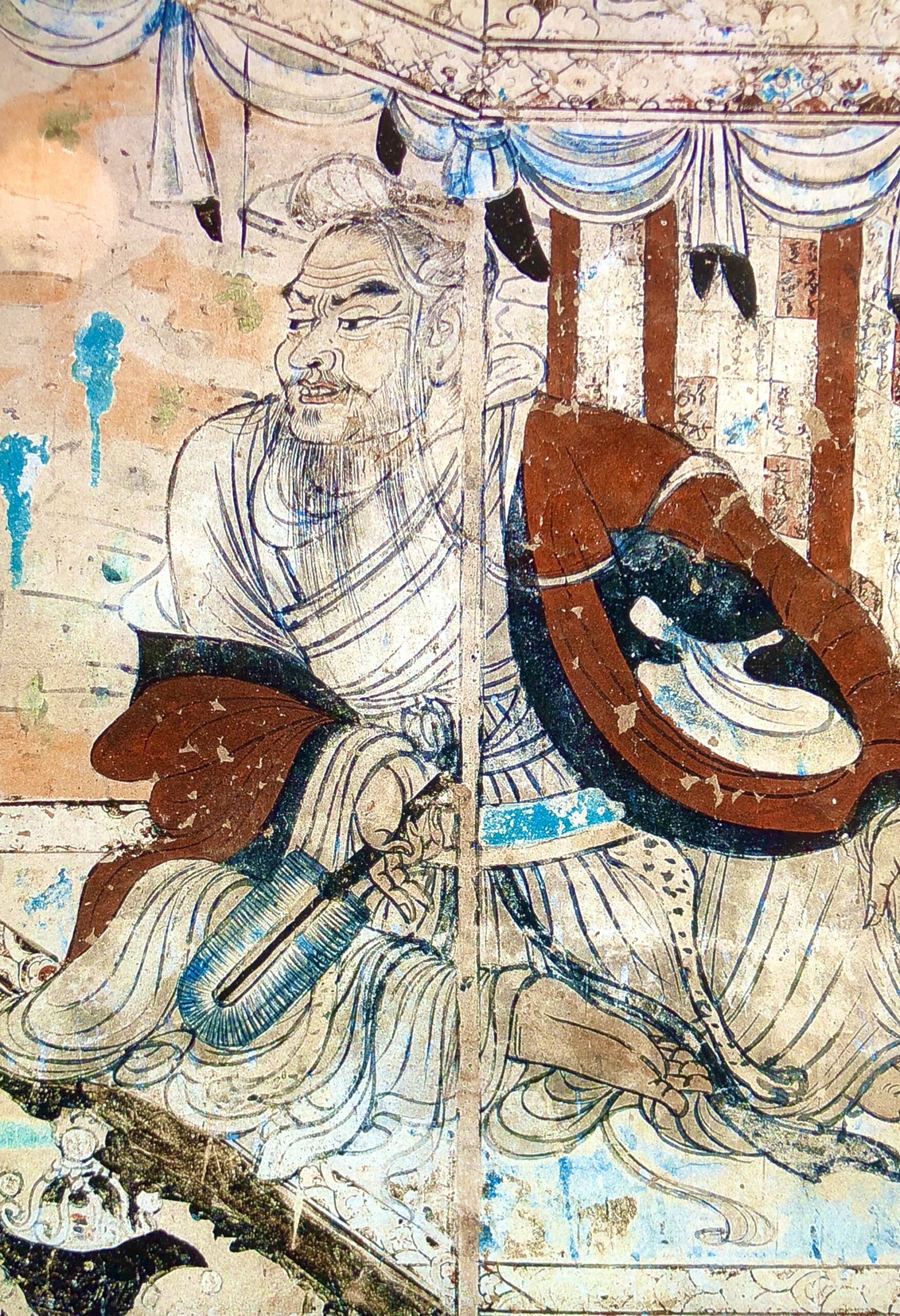 Photo of Vimalakirti debating Manjushri Bodhisattva. Tang Dynasty painting from the Dunhuang Caves.