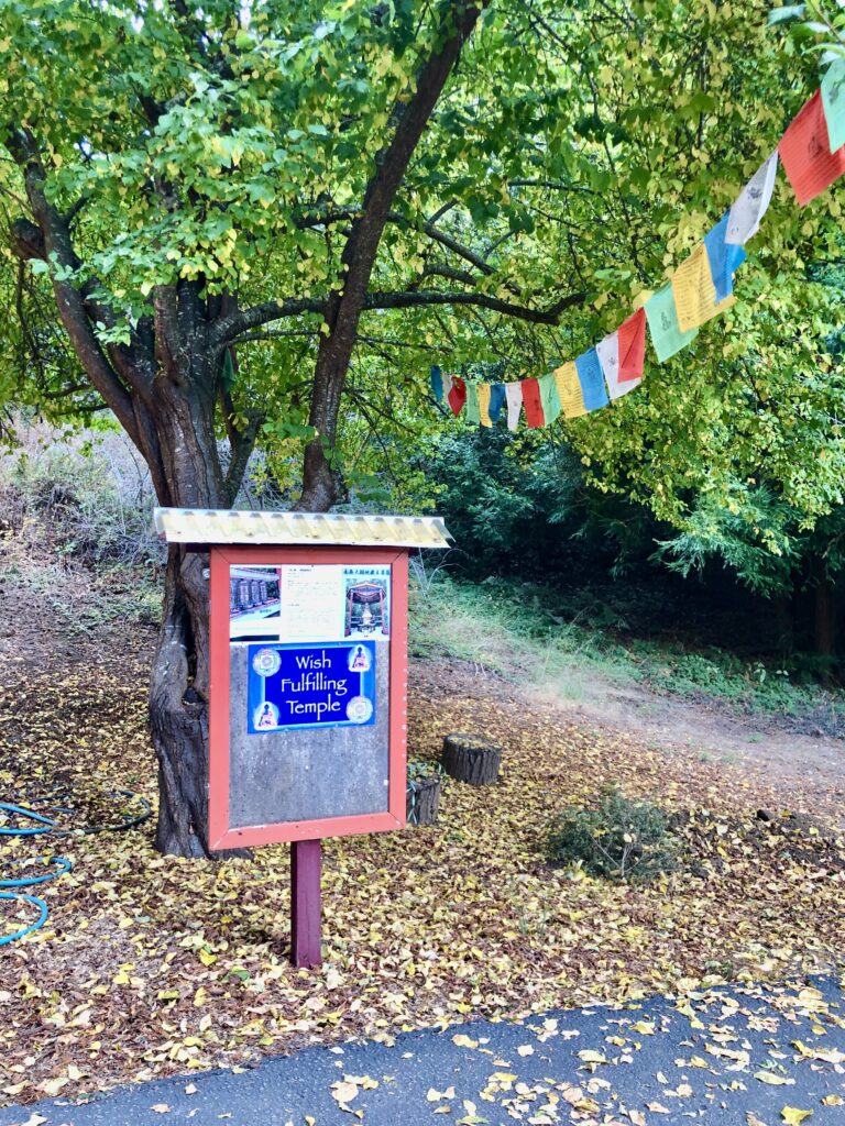 Photo of Wish-Fulfilling Temple Sign at Land of Medicine Buddha, Soquel, California.