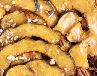 Photo of Air-fryer Acorn Squash with Maple Syrup & Cinnamon Walnuts.