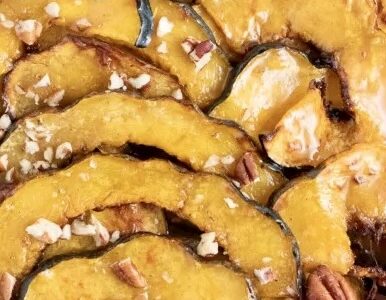 Photo of Air-fryer Acorn Squash with Maple Syrup & Cinnamon Walnuts.