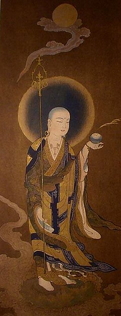 Painting of Ksitigarbha, the earth store bodhisattva, with his staff he uses to pound open the gates of Hell, and his cintamani pearl for illuminating all the various realms of hell, to benefit sentient beings trapped there.