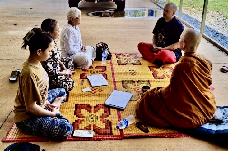 Ayya Saddha leading meditation on the Temple grounds with local sangha and family (8/2024).